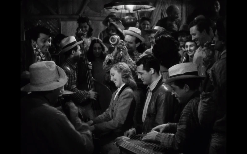 She sings them a song, she's a piano man. She sings them a song, she's a piano man.