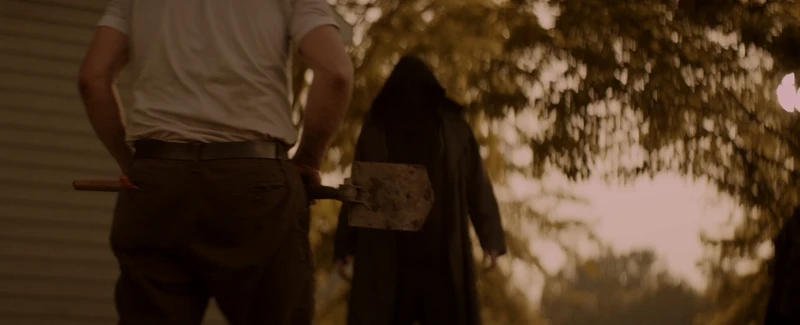 The hooded guy just stands there and does nothing. The hooded guy just stands there and does nothing.