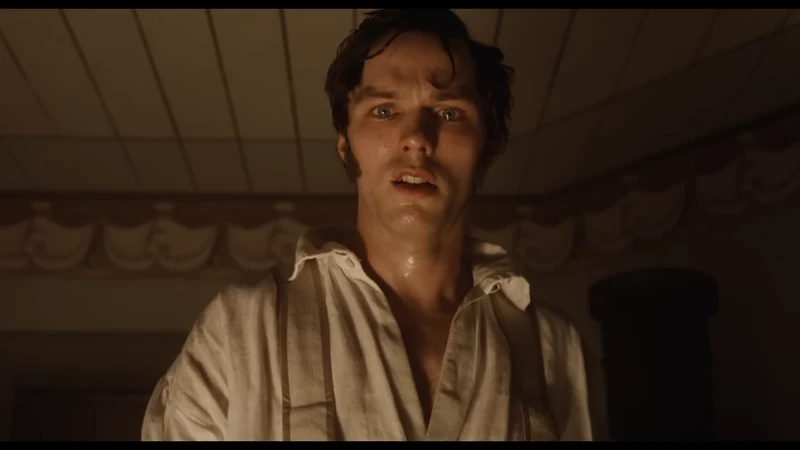 Hoult also stars with a different giant-eyed actress in The Menu. Hoult also stars with a different giant-eyed actress in The Menu.