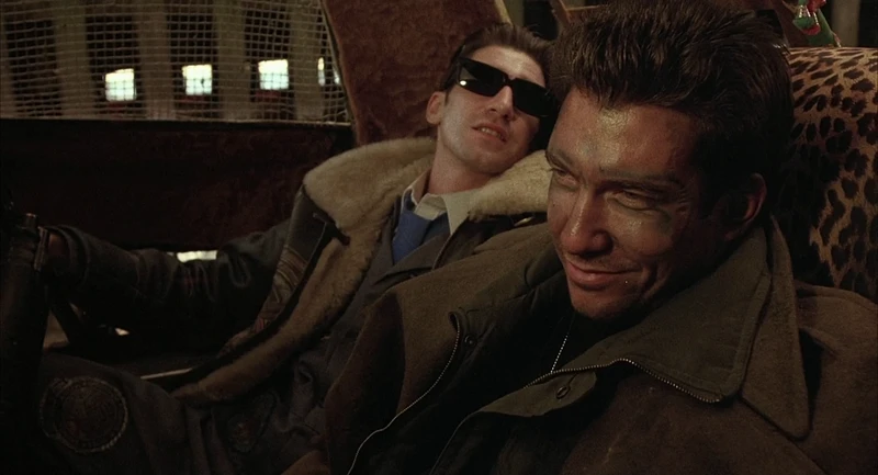 Dylan and pal drive around town, doing a business